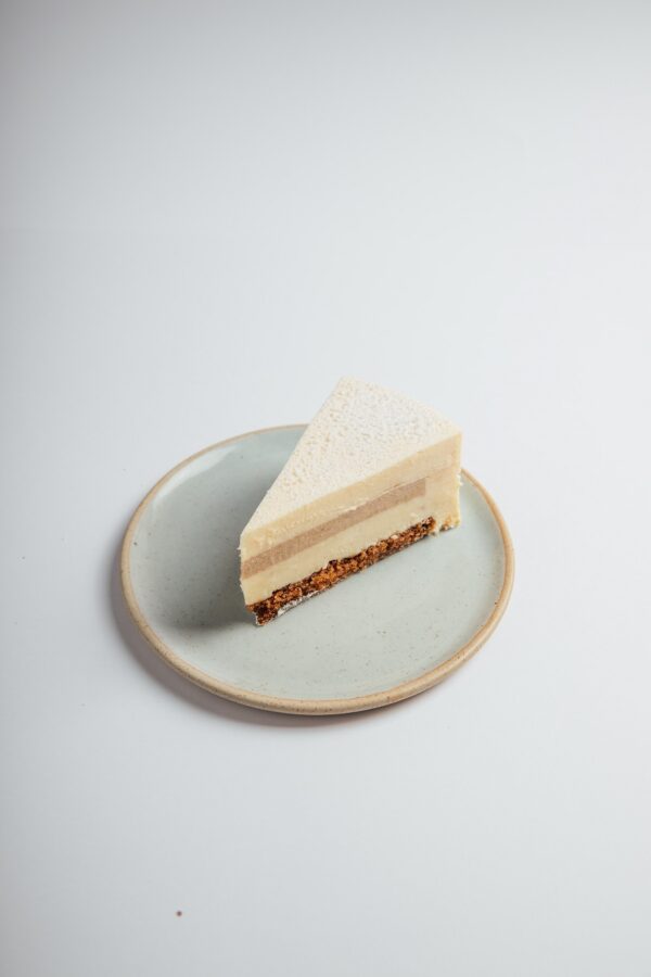Carrot Cheesecake slice served on a plate