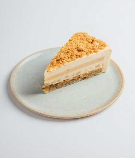 Banoffee cake slice on a white plate